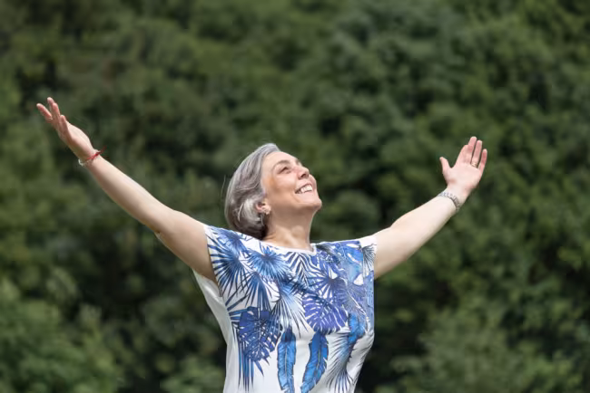 Mands worshipping with arms up high
